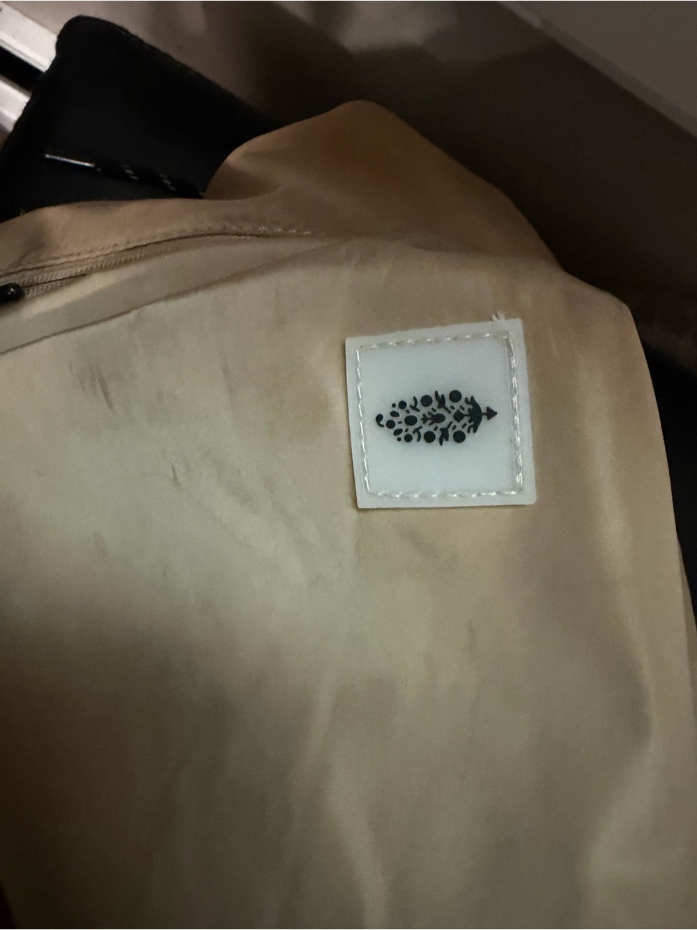 Beige Women's Coat with Leaf Emblem